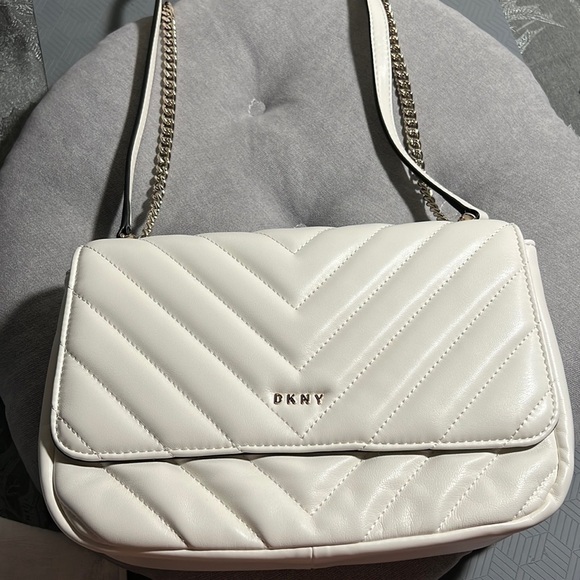 Dkny Handbags - DKNY white crossbody bag with lots of pocket